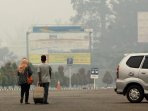 penundaan-penerbangan-karena-kabut-asap_20150903_221829.jpg