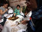 penyandang-disabilitas-membatik-di-hari-batik-nasional_20171002_184850.jpg