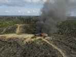 penyegelan-lahan-terbakar-di-taman-nasional-tesso-nilo_20160719_211334.jpg