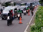 penyepeda-tertib-lintasi-jalur-sepeda-di-jalan-sudirman-jakarta_20200620_085004.jpg