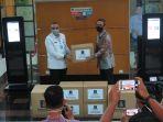 penyerahan-donasi-8000-paket-sembako.jpg