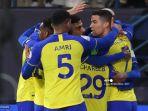 penyerang-al-nassr-cristiano-ronaldo-merayakan-dengan-rekan-setimnya.jpg