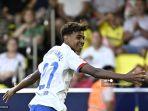 penyerang-barcelona-asal-spanyol-27-lamine-yamal-merayakan-gol.jpg