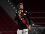 penyerang-bayern-munich-thomas-mueller-bereaksi-selama-pertandingan.jpg