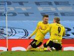 penyerang-dortmund-asal-jerman-marco-reus-kiri-melakukan-selebrasi-dengan-haaland.jpg