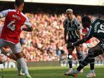 penyerang-manchester-united-marcus-rashford-saat-mencetak-gol-melawan-arsenal.jpg