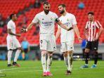penyerang-prancis-real-madrid-karim-benzema-dan-nacho-fernandez.jpg