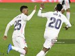 penyerang-real-madrid-vinicius-junior-merayakan-dengan-penyerang-real-madrid-rodrygo.jpg