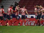 penyerang-uruguay-atletico-madrid-luis-suarez-2ndr-merayakan-bersama-rekan-setimnya.jpg