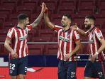 penyerang-uruguay-atletico-madrid-luis-suarez-tengah-merayakan-dengan-mario-hermoso.jpg