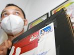 perangko-vaksin-covid-19-foto-jokowi-disuntik-vaksin_20210227_192638.jpg