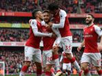 perayaan-gol-pemain-arsenal-shkodran-mustafi_20180312_085609.jpg