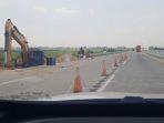 perbaikan-jalan-di-ruas-tol-pejagan-pemalang-jelang-mudik-2024.jpg