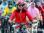 perempuan-berkebaya-mengikuti-balap-sepeda-women-cycling-challenge-di-banyuwangi.jpg