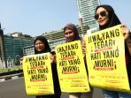 peringatan-hari-aids-sedunia_20191201_183942.jpg