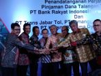 perjanjian-kerjasama-antara-waskita-toll-road-dan-bank-rakyat-indonesia_20180601_100641.jpg