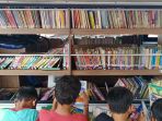 perpustakaan-keliling-kel-rawa-bunga-diminati-warga_20210928_204303.jpg
