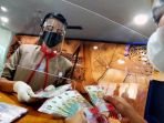 persiapan-uang-tunai-jelang-lebaran_20210509_234225.jpg