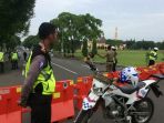 personel-berjaga-sambut-kedatangan-jokowi_20180115_092134.jpg