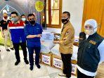 pertamina-group-mendistribusikan-300-pakaian-alat-pelindung-diri.jpg