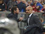 pertemuan-pep-guardiola-dan-diego-simeone-pada-mei-2016.jpg
