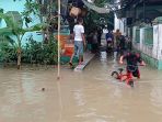 perumahan-kampung-cogreg-masih-kembanjiran_20220909_155153.jpg