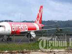 pesawat-airasia-saat-di-bandara-ngurah-rai_20160527_125049.jpg