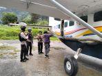 pesawat-asia-one-air-dengan-seri-pk-ltf-yang-ditembaki-orang-tak-dikenal.jpg