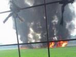 pesawat-f-16-terbakar_20150416_094602.jpg
