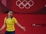 petenis-belgia-lianne-tan-melepaskan-tembakan-ke-gawang-gregoria-mariska.jpg