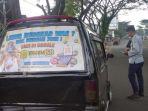 petugas-dishub-sukabumi-jawa-barat-saat-memeriksa-angkot-dengan-iklan.jpg
