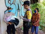 petugas-kepolisian-saat-mengambil-keterangan-saksi-di-lokasi-penemuan-bayi.jpg