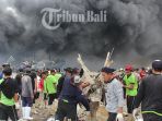 petugas-padamkan-api-di-pelabuhan-benoa_20180709_134633.jpg