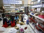petugas-rsud-slamet-bersihkan-obat-akibat-banjir-bandang_20160926_162904.jpg