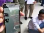 petugas-satpol-pp-temukan-video-porno-di-puluhan-hp-pelajar-yang-didapati-m_20181010_084507.jpg