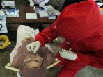 pfi-pusat-gelar-swab-antigen-covid-19_20210214_201251.jpg