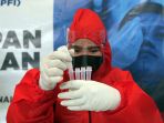 pfi-pusat-gelar-swab-antigen-covid-19_20210214_201437.jpg