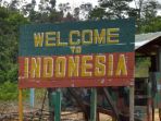 plang-batas-negara-di-perbatasan-indonesia-malaysia_20180924_111344.jpg