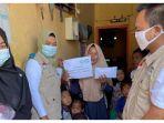 pln-serahkan-bantuan-pada-janda-16-anak.jpg
