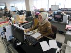 pns-mulai-masuk-kerja-usai-libur-lebaran_20170703_164023.jpg