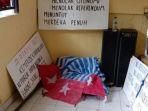 polisi-amankan-8-orang-dan-29-bendera.jpg