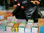 polisi-amankan-penimbun-masker-dan-hand-sanitizer-di-jateng_20200304_163926.jpg