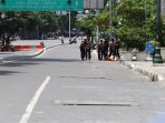 polisi-baku-tembak-dengan-teroris-di-sarinah-thamrin_20160115_161320.jpg