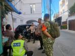 Puluhan Polisi Apel di Gang Sempit, Perusahaan Motor Listrik MBG Hanya Sesekali Orang Keluar Masuk