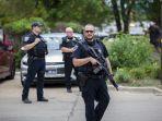 polisi-berkumpul-di-lokasi-penembakan-di-highland-park-illinois.jpg