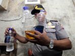 polisi-bongkar-jaringan-miras-oplosan-di-cicalengka-bandung_20180419_222648.jpg
