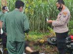 polisi-dan-petugas-medis-mengamankan-jenazah-korban-sebelum-dievakuasi.jpg
