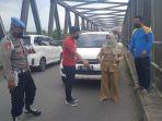 polisi-di-lokasi-kejadian-laporan-palsu-perampokan-uang.jpg