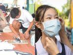 polisi-gerebek-pabrik-daur-ulang-masker-di-thailand.jpg