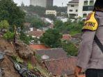 polisi-mengecek-kondisi-longsor-di.jpg